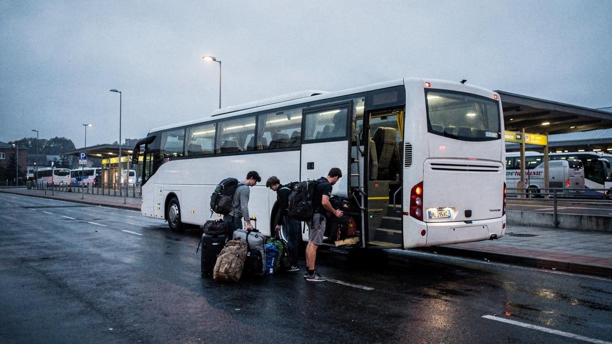 Coach parked at a European terminal before a morning student departure
